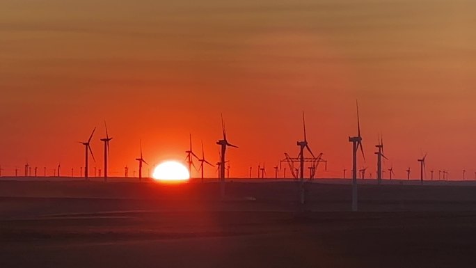 草原夕阳风电风车晚霞