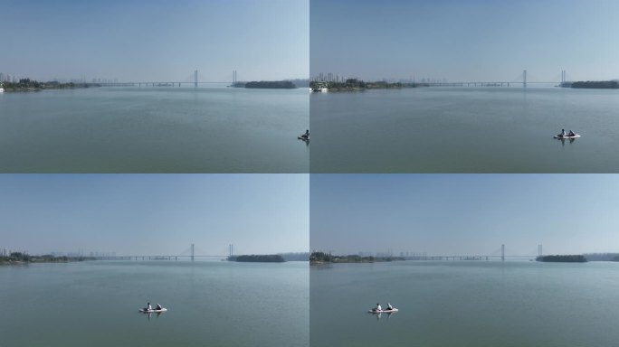 航拍襄阳汉江湿地划桨板小船月亮湾自然风光