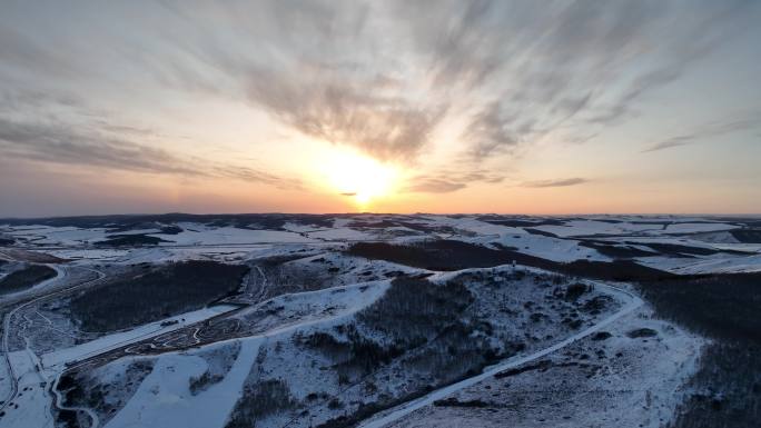 航拍丘陵山地雪景暮色