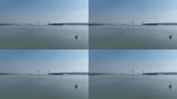 航拍襄阳汉江湿地划桨板小船月亮湾自然风光