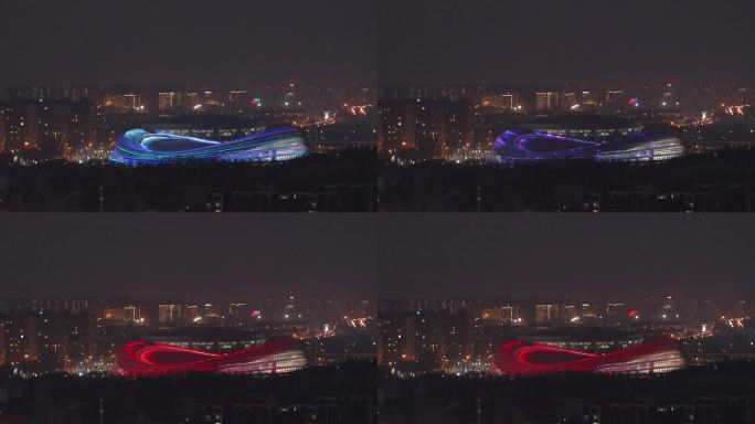 高清实拍夜色中的北京速滑馆冰丝带灯光秀