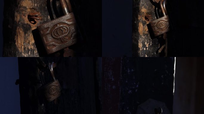 光影下的古老的木板门和锁
