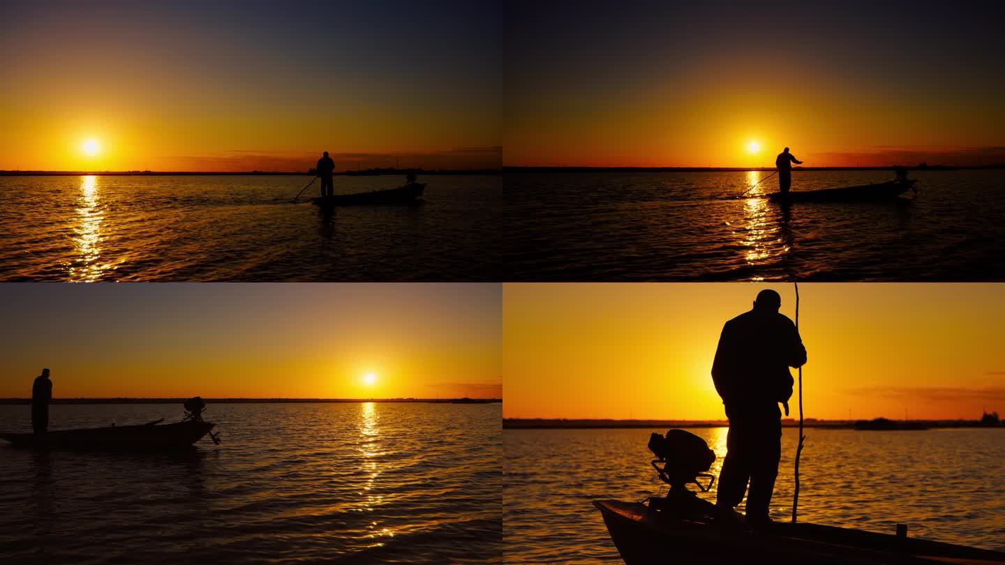 夕阳下湖面上的船夫