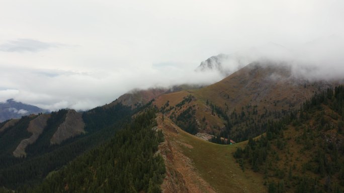 新疆航拍穿过云层山脉森林震撼风景4K大片