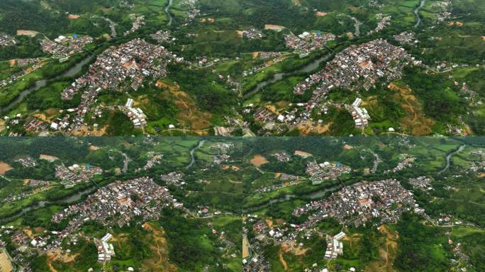 在多云的哥伦比亚，高空无人机拍摄的环绕圣拉斐尔村的照片