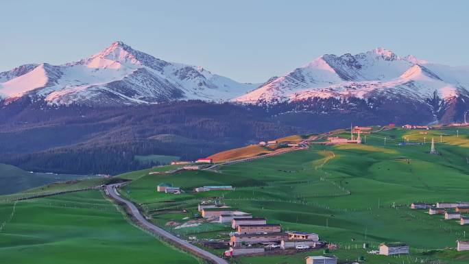 航拍新疆雪山草原牧场