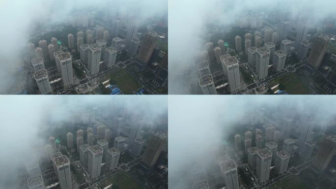 航拍云雾中武汉中央商务区CBD高楼街景