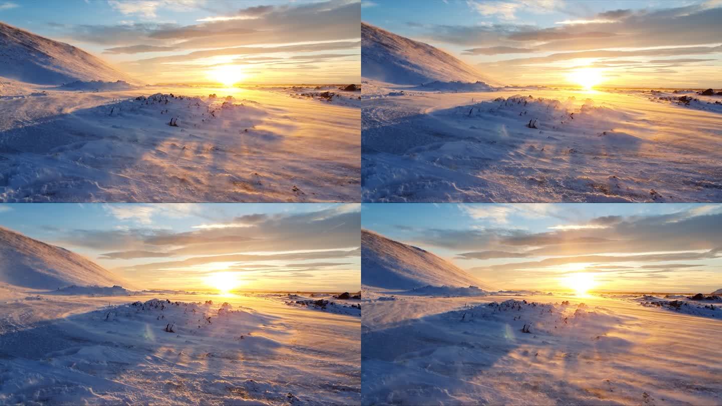 冰岛高地上的夕阳和飞雪