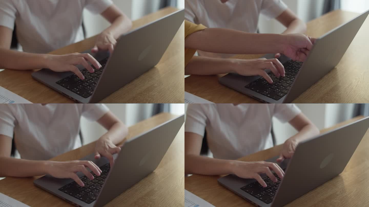 一个女人打电脑键盘的特写镜头。