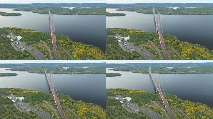 瑞典Hogakustenbron悬索桥的景色，宁静而秋天的森林。无人机航拍