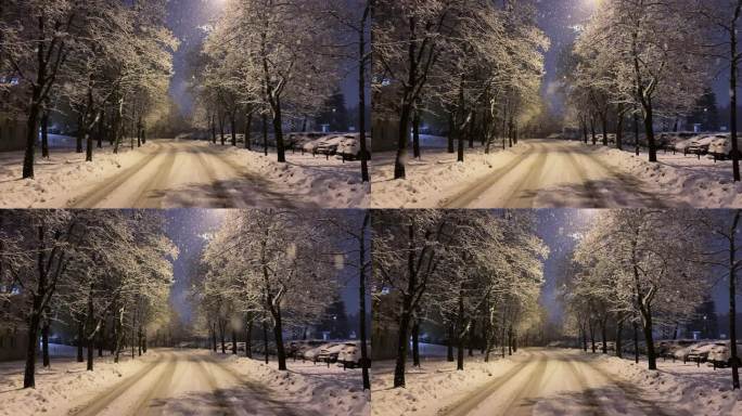 在冬季暴风雪的傍晚，白雪覆盖的街道