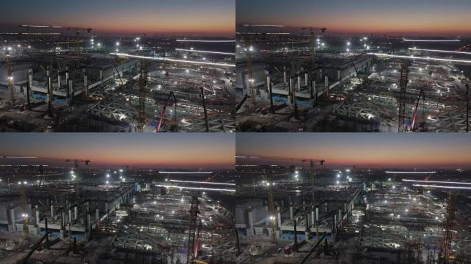 航拍鸟瞰上海松江枢纽建筑工地夜景