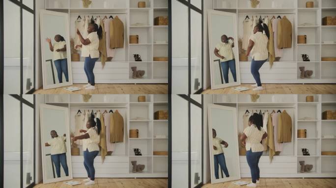 黑人女性为减肥而兴奋。快乐的非洲超重女性在家里跳舞。20多岁的女人想减肥。