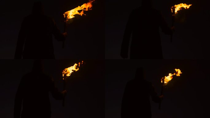 火把黑暗实拍火燃烧人物剪影