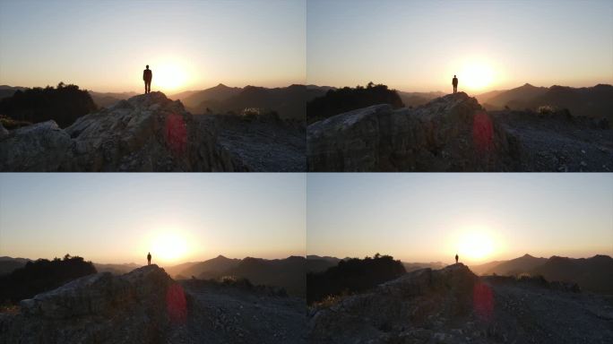男人站在山顶眺望远方孤独思考哲学意境向往