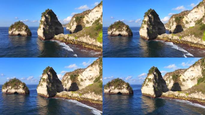 印度尼西亚钻石海滩旅游目的地的热带岛屿和夏季海滩的无人机航拍视图。湛蓝清澈的海水和洁白的沙滩。