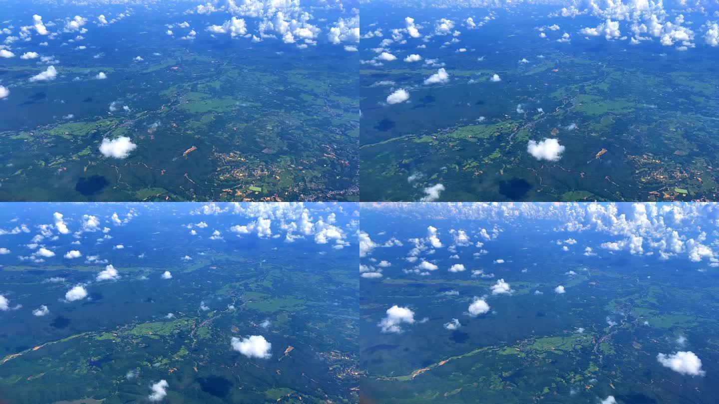 飞机在泰国清迈市上空飞行，途中经过云和山脉