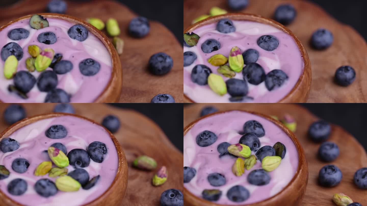 新鲜的紫色和白色酸奶，带有蓝莓和蓝莓的味道