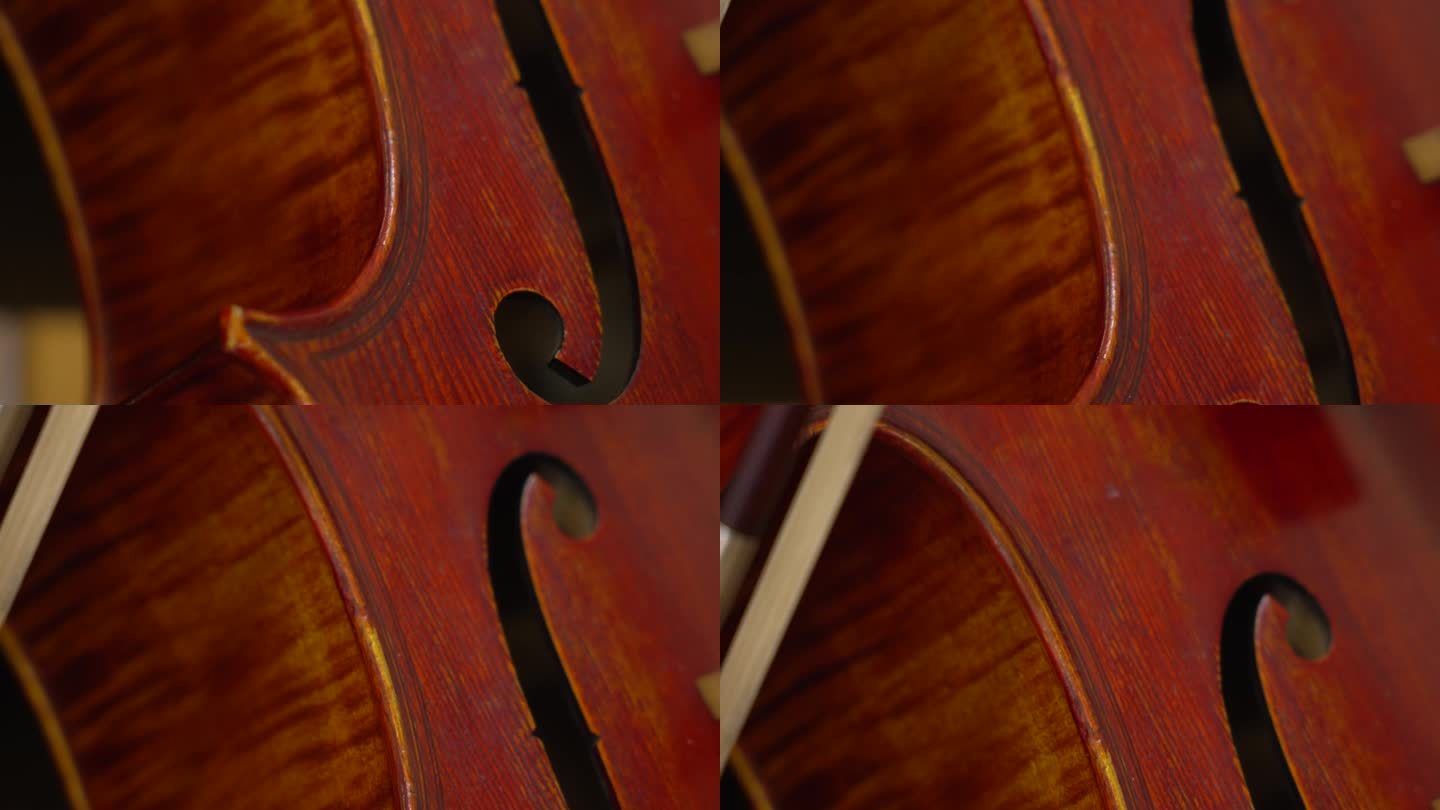 一个精美制作的棕色大提琴的特写视图与休息的法国弓。
