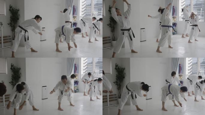 日本人在空手道课上伸展和热身