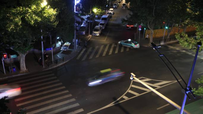 夜间窗外马路车流人流延时