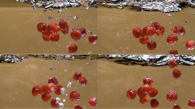 树莓落水的超慢动作，1000帧/秒。美味的覆盆子撞击水面。