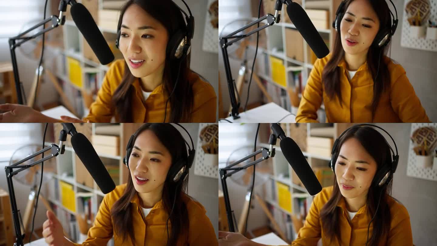 日本裔女性的B-roll，在她的家庭工作室录制播客