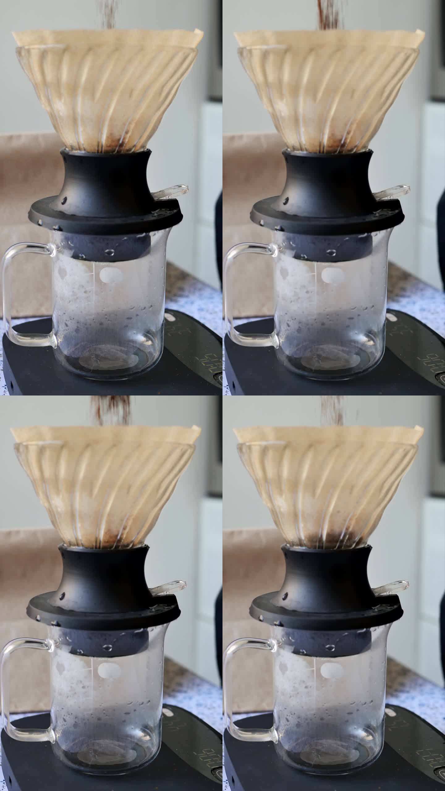 将磨碎的芳香咖啡倒入带有过滤器的杯子中，使用滴灌方法制备咖啡饮料。