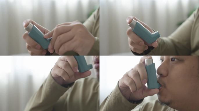 亚洲男子在家使用哮喘吸入器的特写