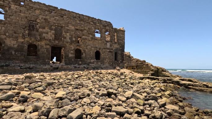 摩洛哥朱比角，大西洋之家。残破的堡垒，一片潮汐，沙滩