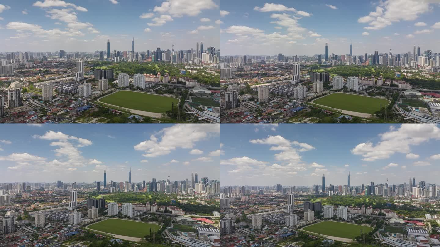 阳光明媚的一天飞越吉隆坡市区公园现场航拍全景4k延时马来西亚