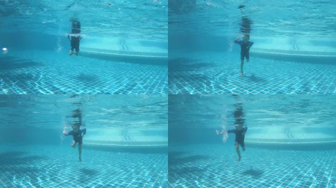孩子享受暑假，快乐的男孩在阳光明媚的日子跳进游泳池，4K动态场景