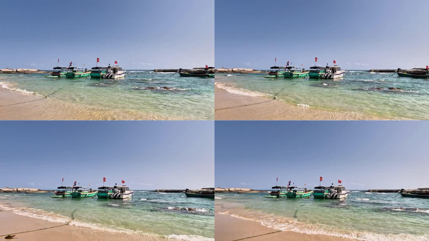 海南文昌铜鼓岭渔村石头公园海浪拍打渔船