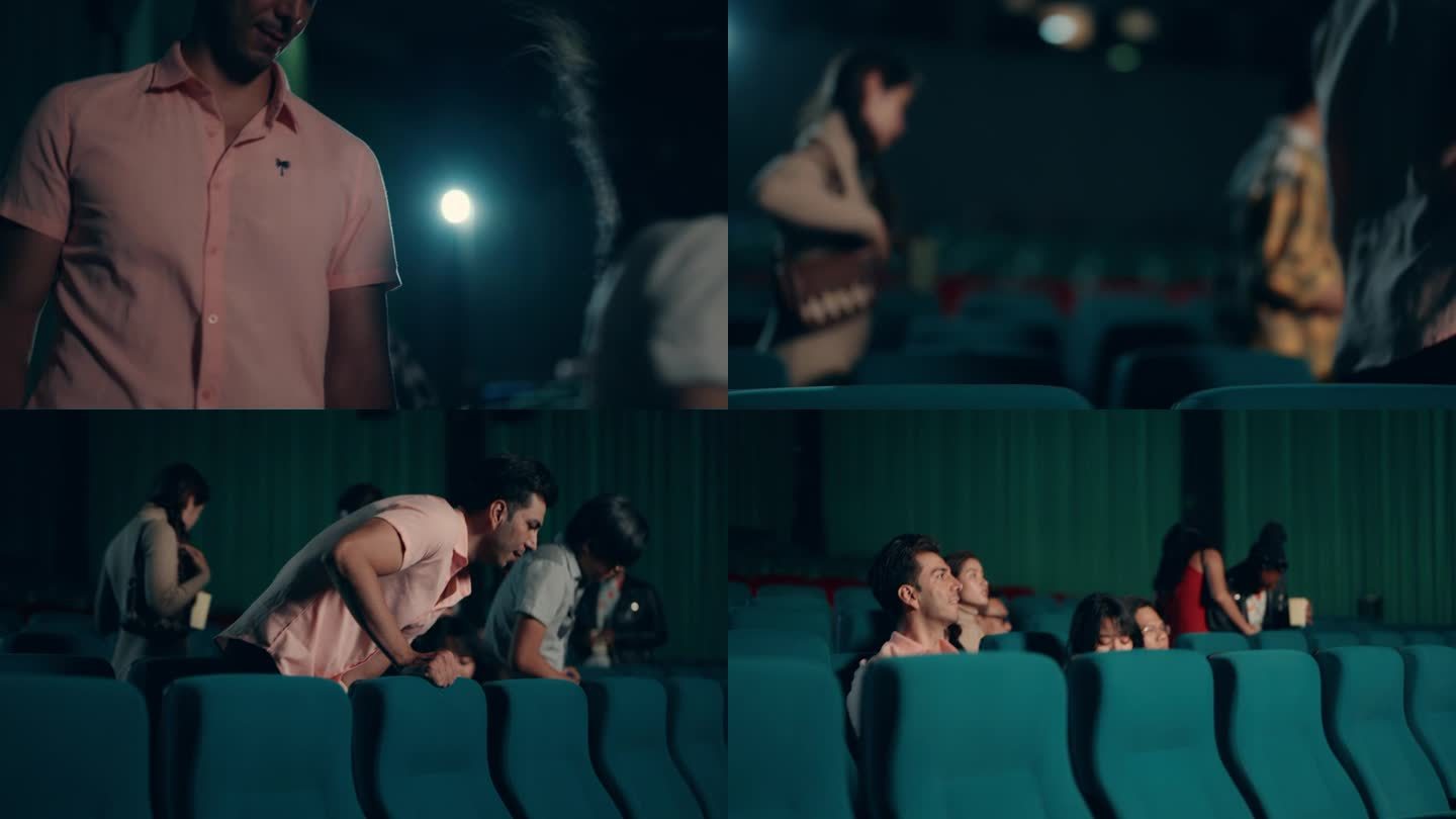 快乐的年轻亚洲女子和她的男朋友去电影院看电影。周末的活动。的生活方式。