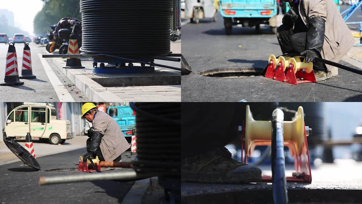 城市建设 工人 给路灯铺设地下电缆