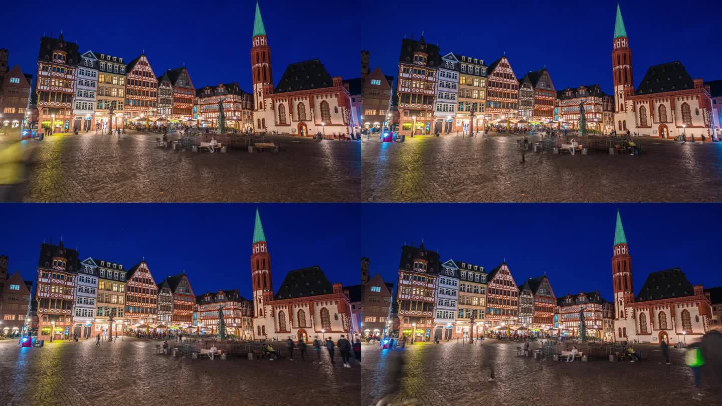 德国法兰克福，罗默贝格历史悠久的集镇广场，正义喷泉和老圣尼古拉斯教堂，夜景中的人群游客步行和观光景点