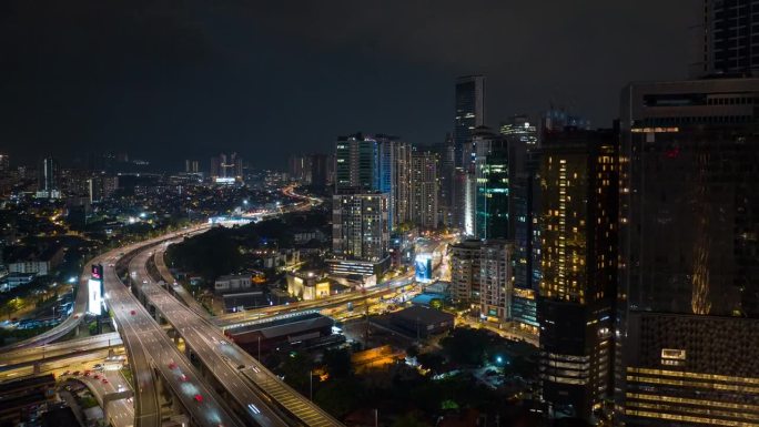 夜间照明吉隆坡市中心交通街道十字路口航拍全景4k延时马来西亚
