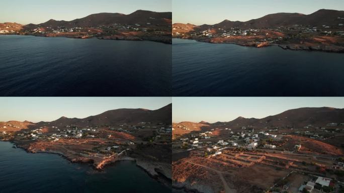 无人机小车倾斜到希腊西罗斯海岸小镇日落，文字空间