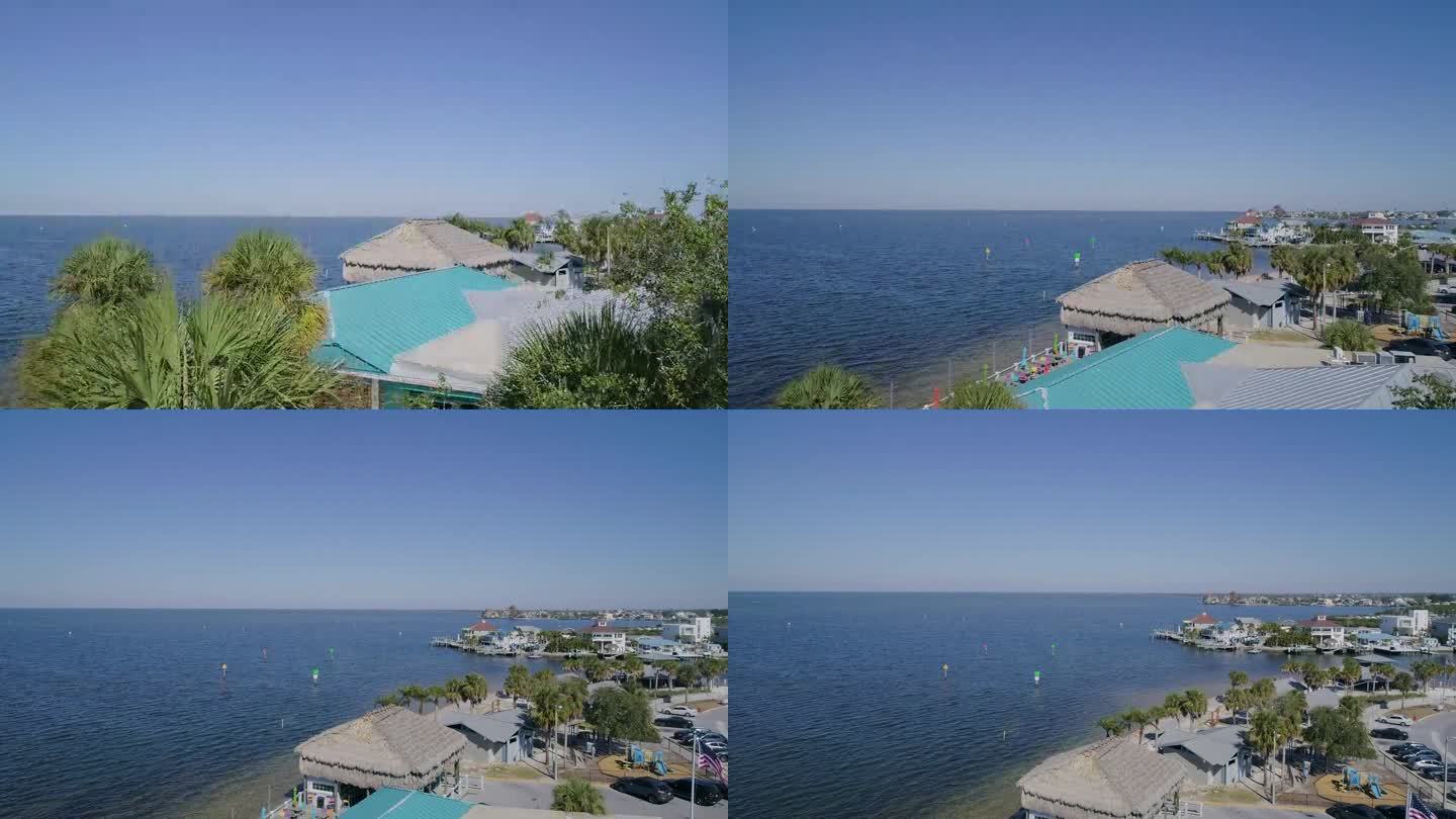 4K无人机视频(基座拍摄)海滩酒吧在墨西哥湾的哈德逊海滩在佛罗里达州