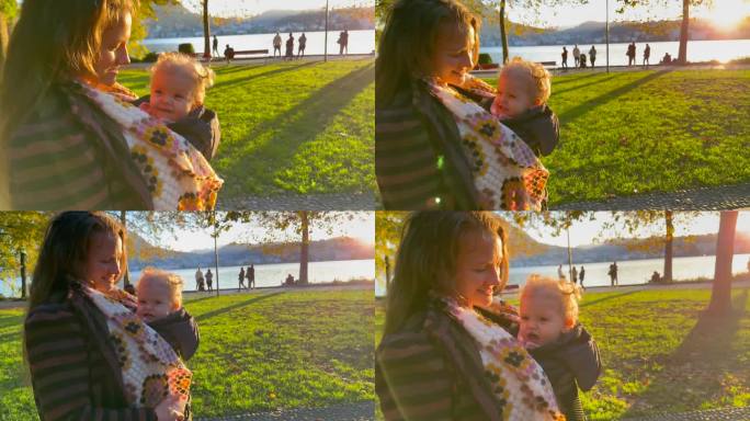 夕阳下，母亲和婴儿漫步公园