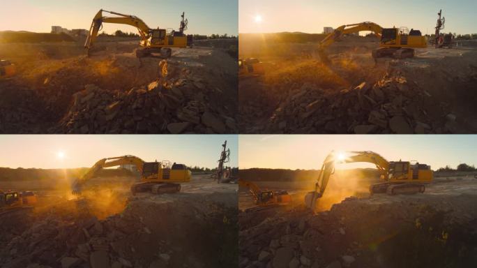 空中无人机拍摄的建筑工地在阳光明媚的日子:工业挖掘机挖掘岩石奠定基础的新公寓大楼。人们使用重型机械来
