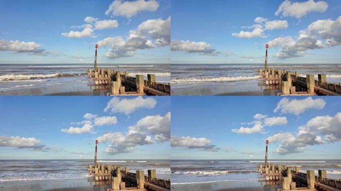 海浪冲击木制石阵的慢镜头