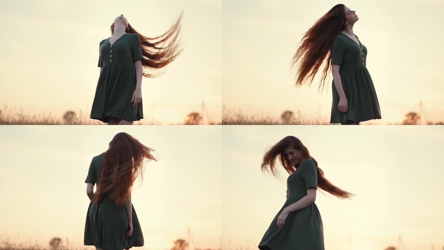 有一头红长发的女孩在夕阳下的田野里翩翩起舞。