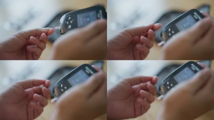 一位亚洲妇女在房间里用血糖测试来检查她的血糖。