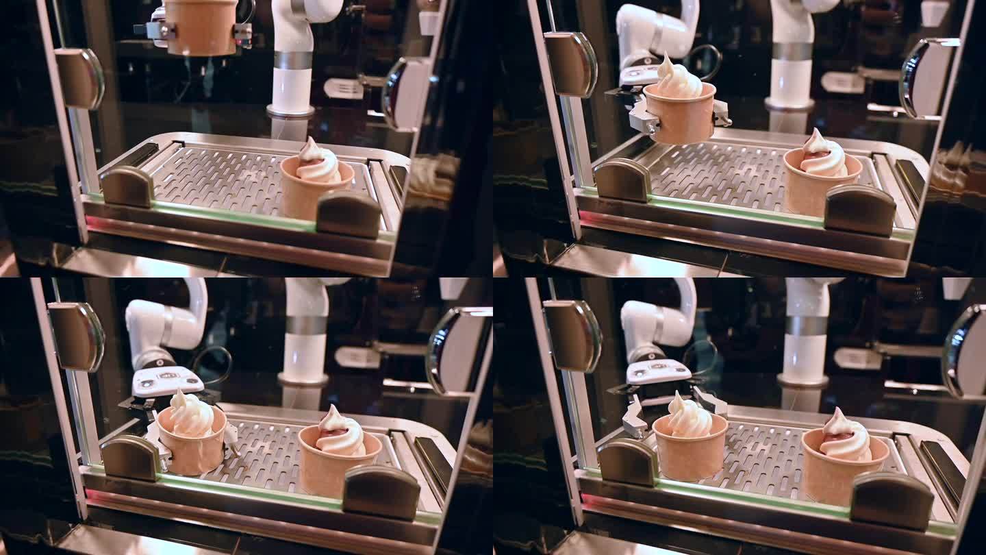 一个机器人手在端冰淇淋杯，机器人厨师的镜头
