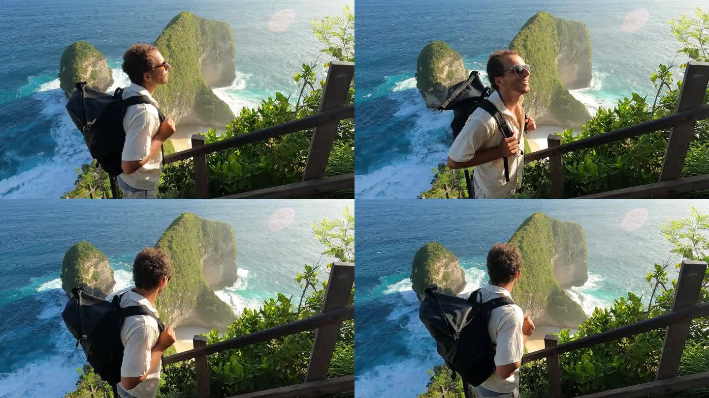 印度尼西亚巴厘岛努沙佩尼达岛，男游客观赏美丽的曼塔湾或克林金海滩的视频