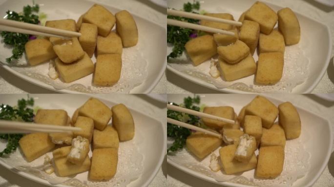 炸脆皮豆腐中国香港粤菜用筷子吃4k