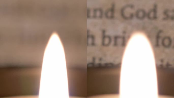 旧圣经点燃蜡烛垂直视频