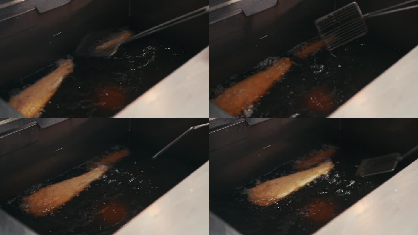 炸鱼油炸美食实拍视频特写镜头
