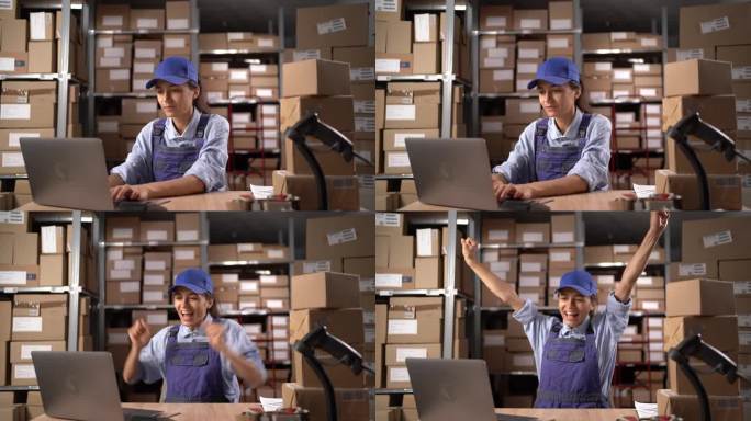 开心的仓库女工拿着笔记本电脑在仓库里，举起双臂欢呼。她因为有价值和工作效率而得到了加薪。
